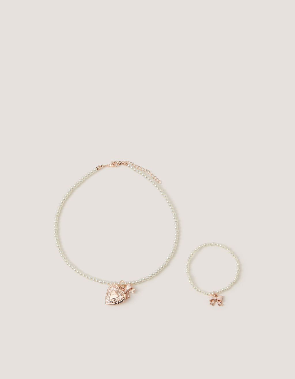 SET AKSESOARA - PEARL BOW LOCKET AND BLET