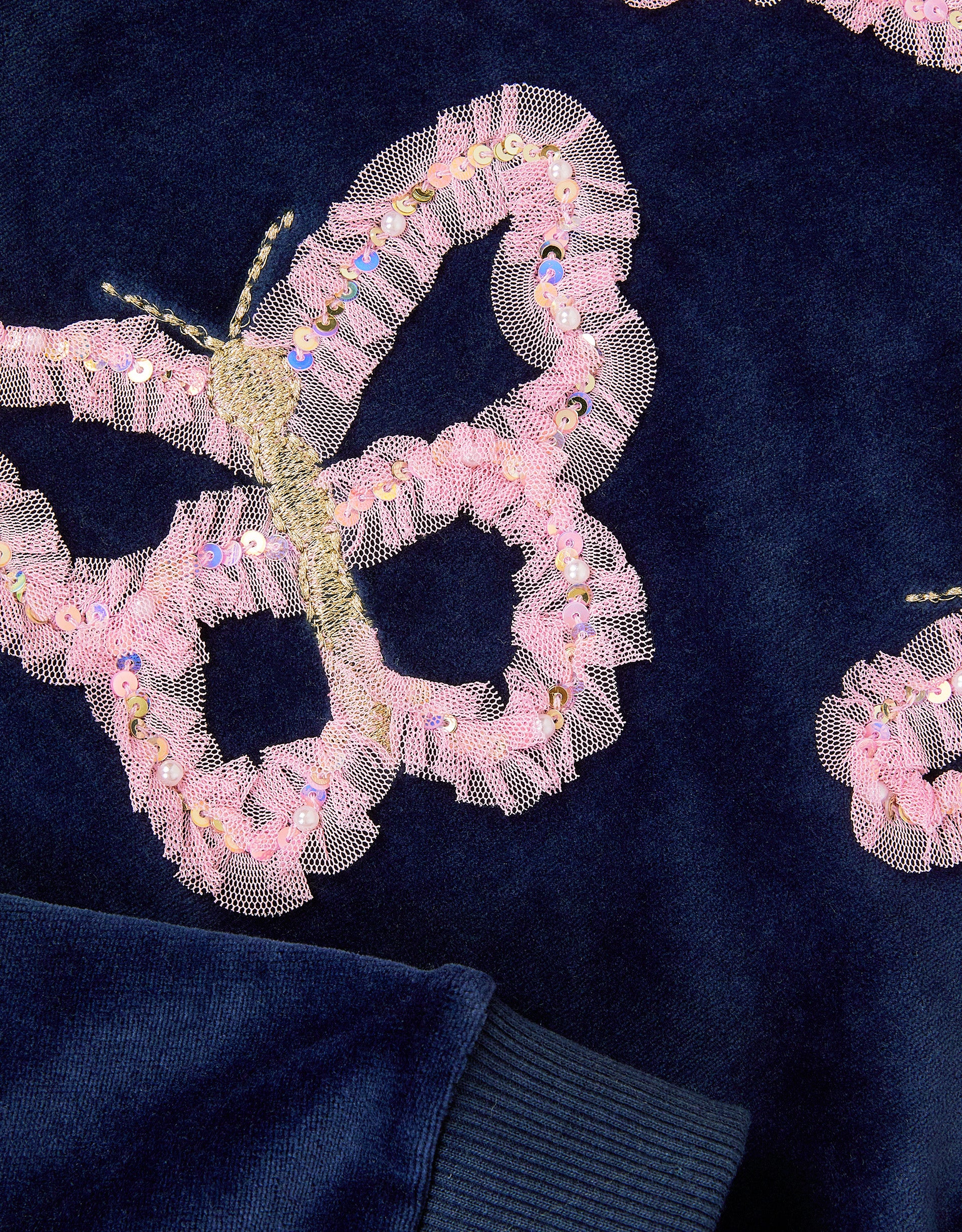 DUKS - BTTFLY EMB VLR SWEAT TOP