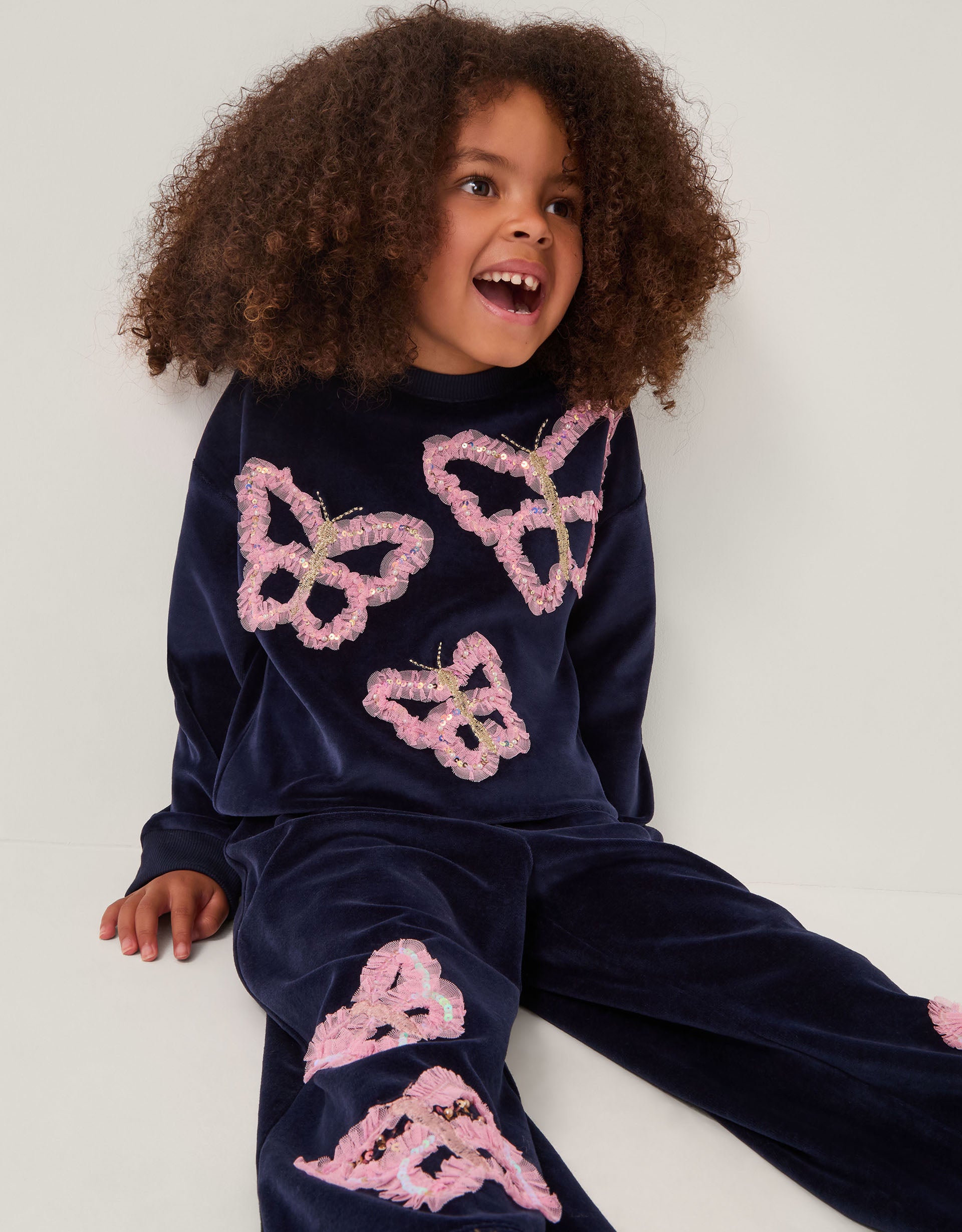 DUKS - BTTFLY EMB VLR SWEAT TOP